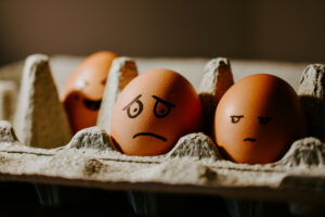 eggs with expressions drawn on faces