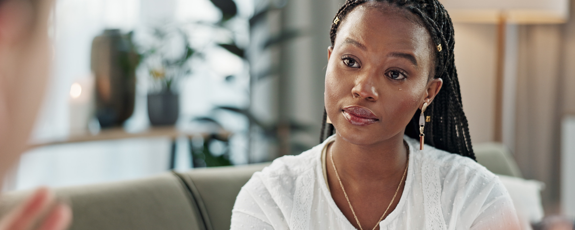 young woman listens intently